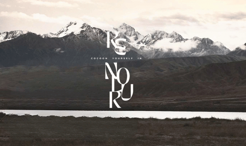 Imagen de fondo de las montañas de Mongolia con el logo de Re'Nolur sobreimpreso