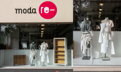 Dos maniquís delante dentro del escaparate de una tienda de Moda Re-