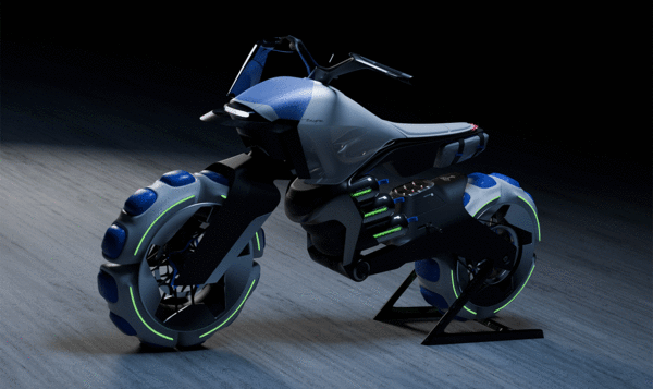 Moto eléctrica ffroad con detalles azules y grandes volúmenes en ruedas sobre un fondo oscuro con suelo de parquet